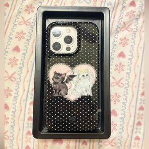 Velvet Caviar 16 Pro size White and Black Kitten iPhone Case